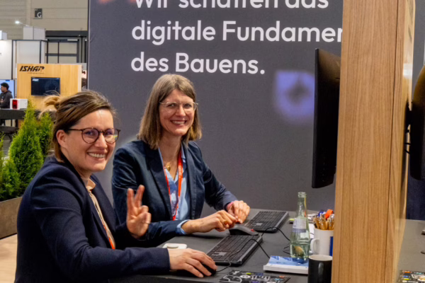digitalBAU 2026: Das Team von NetzWerkPlan am Stand der Orca Group